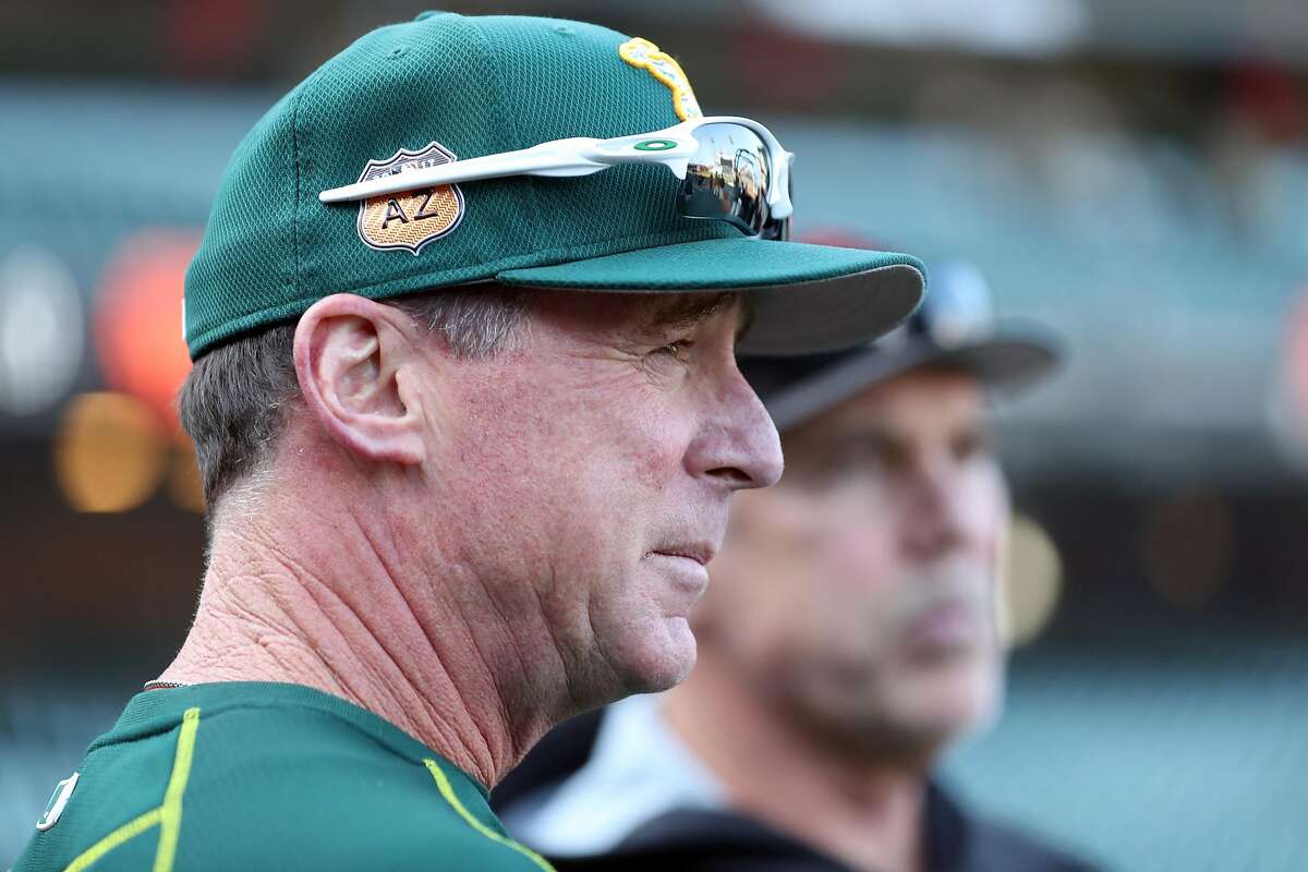 Oakland Athletics' manager Bob Melvin and San Francisco Giants' manager Bruce Bochy before Bay Bridge Series begins at AT&T Park in San Francisco, Calif., on Thursday, March 30, 2017.