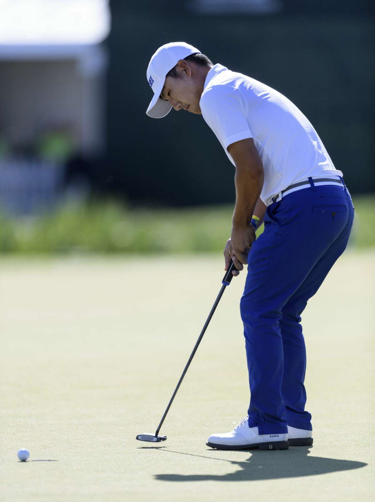 Sung Kang misses a short putt on the 18th green during the the first round of the Houston Open golf tournament Thursday, March 30, 2017, in Humble Texas. The bogey dropped Kang one shot behind Rickie Fowler after the first round. (Wilf Thorne/Houston Chronicle via AP)