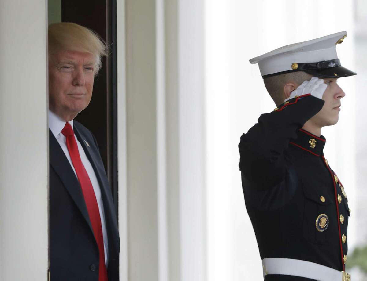 President Donald Trump awaits the arrival of Danish Prime Minister Lars Lokke Rasmussen at the White House in Washington, Thursday, March 30, 2017. (AP Photo/Pablo Martinez Monsivais)