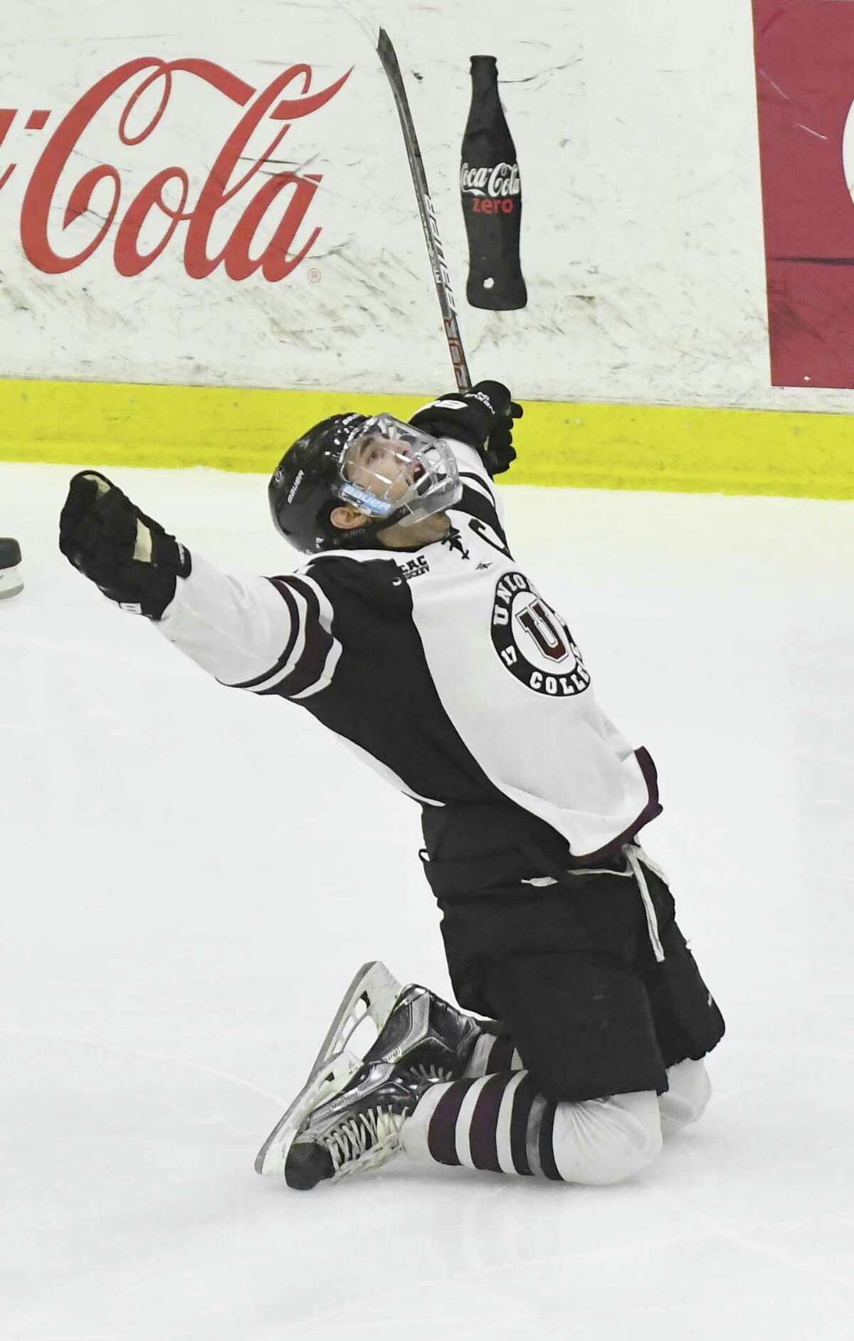 Union's Mike Vecchione (21) celebrates his game winning goal against Princeton goaltender Colton Phinney during the first overtime period of a NCAA hockey quarterfinal game of the ECAC conference in Schenectady, N.Y., Saturday, March 11, 2017. Union won 4-3. (Hans Pennink / Special to the Times Union) ORG XMIT: HP116 ORG XMIT: MER2017031122050801
