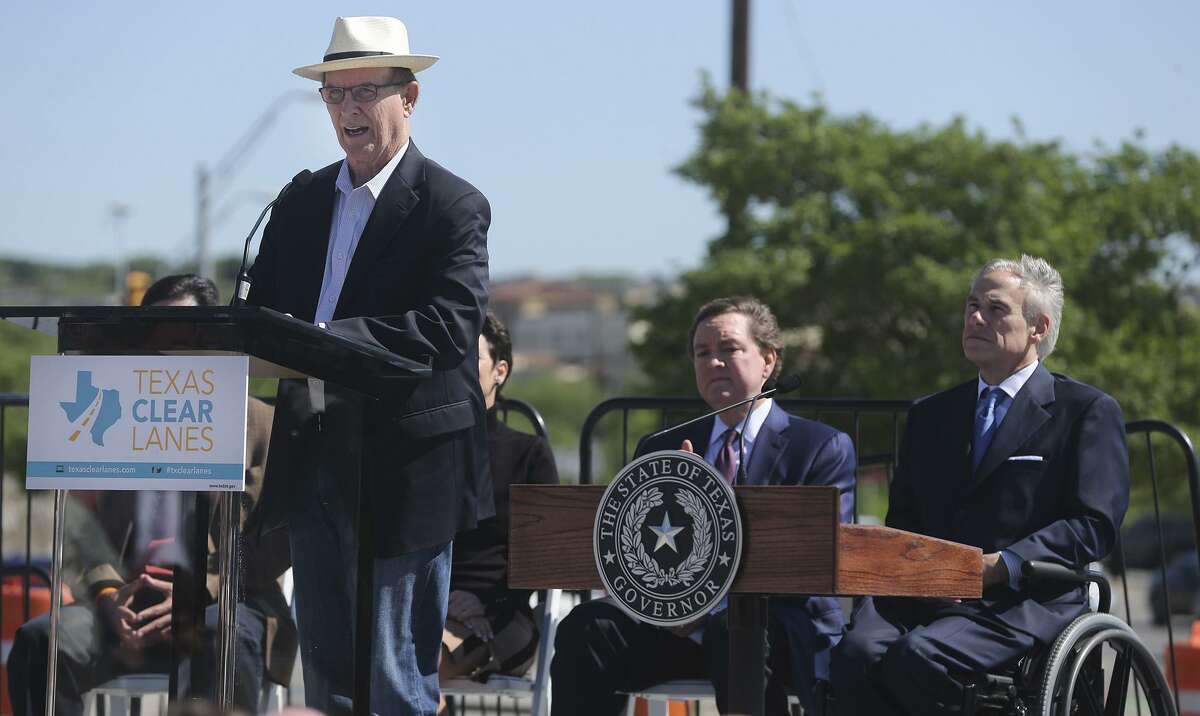 Bexar County Judge Nelson Wolff (at lectern) speaks as Texas Governor Greg Abbott (right, seated) and Texas Transportation Commissioner J. Bruce Bugg, Jr. (center) listen about an expansion of U.S. Highway 281 that will help to reduce traffic congestion in the northern part of San Antonio. The first of two phases stretching eight miles will get underway in May. It will add non-tolled expressway lanes as well as high occupancy vehicle lanes from Loop 1604 to Stone Oak Parkway.