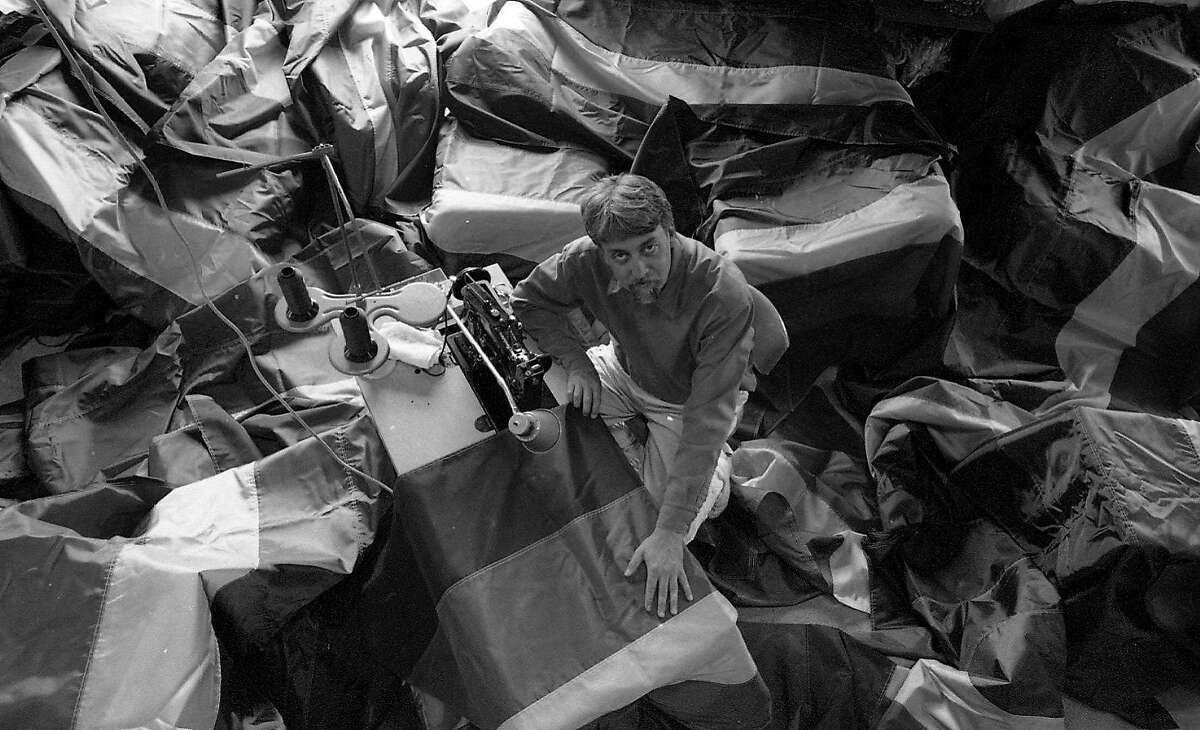 Gilbert Baker, artist who designed the Rainbow Flag, making 500 new flags for an installation on Market St. 06/10/1998 Gay Rights Project