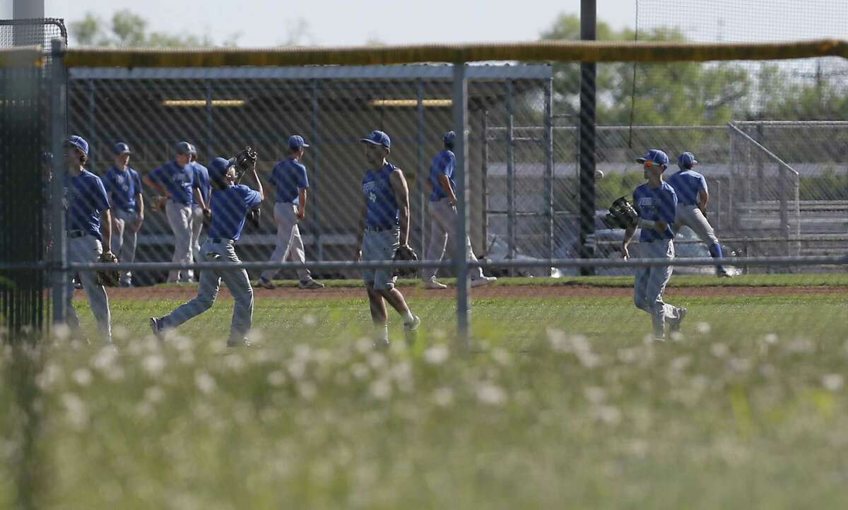 The La Vernia High School baseball team practice on Thursday, Mar. 30, 2017. In the wake of recent events which resulted in arrests of 10 students for hazing other students and charged with sexual assault, La Vernia ISD Superintendent Jose H. Moreno has urged his staff, administrators and teachers to help students return to normalcy. Citing that the students charged are a mere small percentage of their high school population which is about 1,075 enrolled, Moreno suggests that the alleged horrific acts taken were fostered by an "underground culture of acceptance" and are not in accordance to the district's core values. At the high school, Moreno said educators will help students acknowledge that something occurred, that things will be okay and that "we are moving forward" with their commitment to the students and to education. On Thursday, as part of that return to normalcy, the high school baseball team returned to practice. (Kin Man Hui/San Antonio Express-News)
