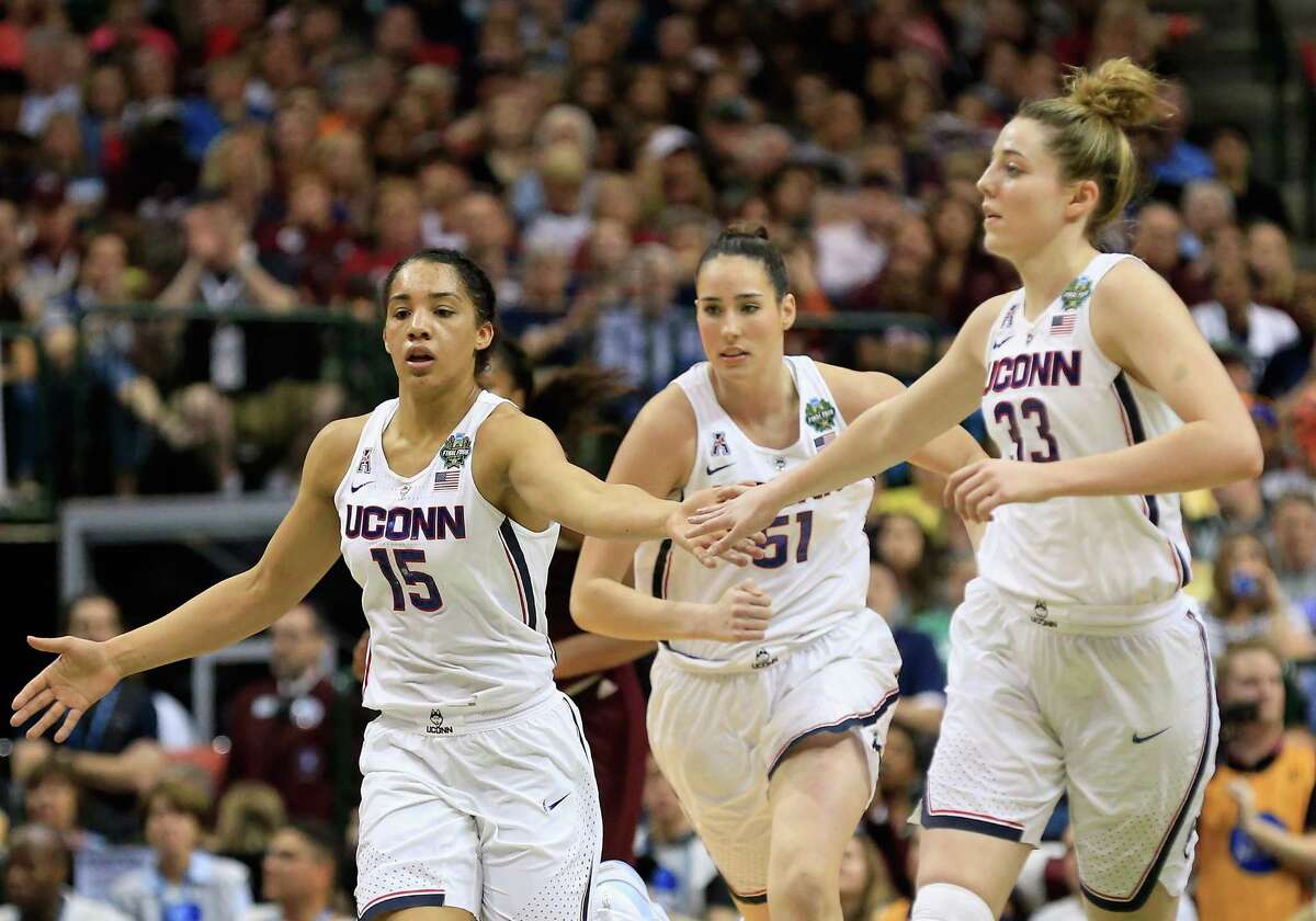 DALLAS, TX - MARCH 31: Gabby Williams #15, Natalie Butler #51, Katie Lou Samuelson #33 of the Connecticut Huskies celebrate in the first half against the Mississippi State Lady Bulldogs during the semifinal round of the 2017 NCAA Women's Final Four at American Airlines Center on March 31, 2017 in Dallas, Texas.