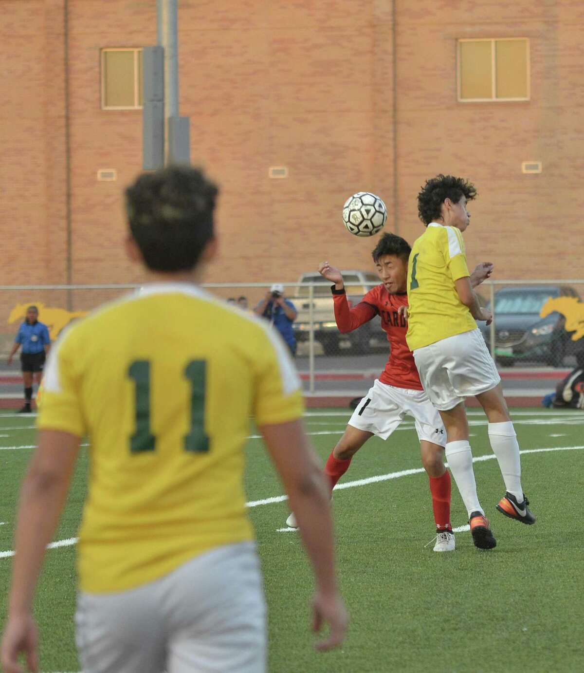 Nixon’s Kluivert Flores battles for the ball as the Mustangs topped SA Southside 1-0 on Friday in Laredo in the area round of the state playoffs.