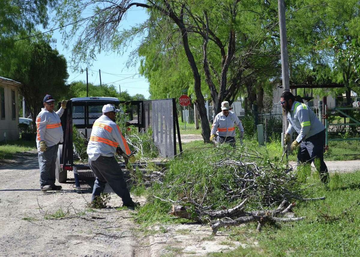 The crew works together to clean up the Webb County community.