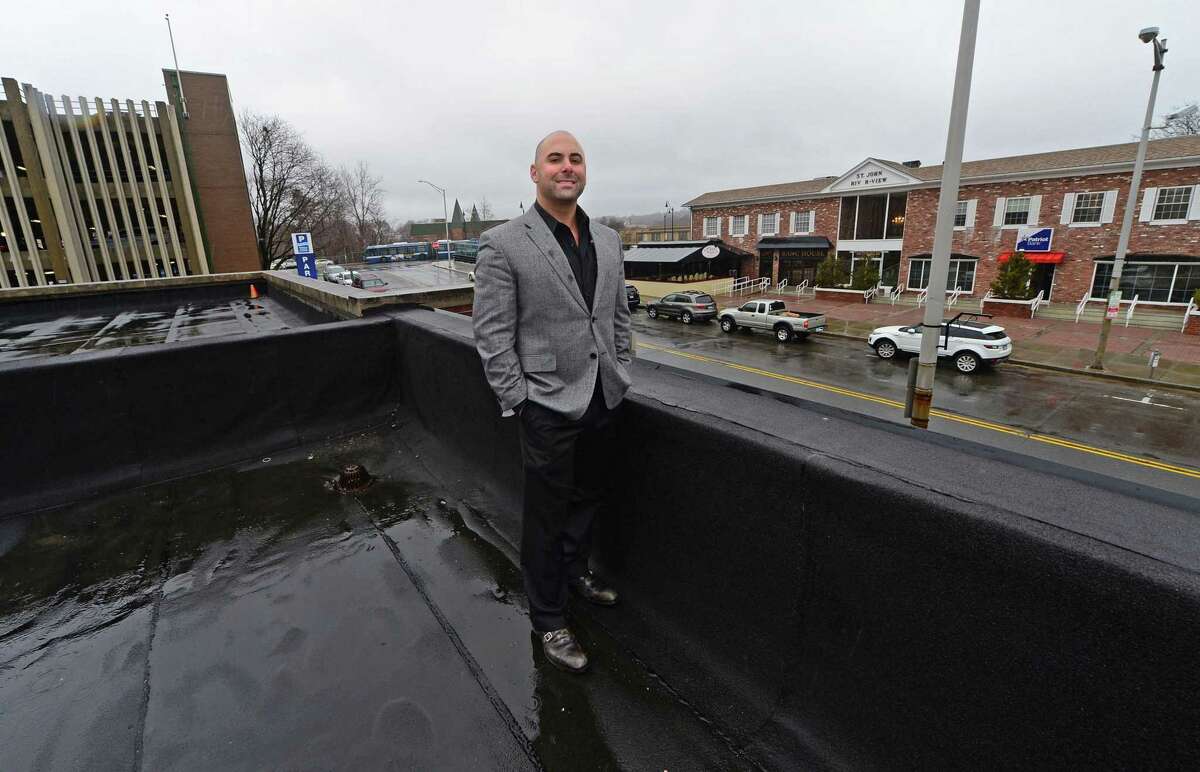 Jason Petrini, owner of MKT Bistro, at his 64 Wall St. location on Friday plans an extensive expansion which includes a rooftop dining concept as well as connecting to My Three Sons next door to offer parents more adult fare in Norwalk.