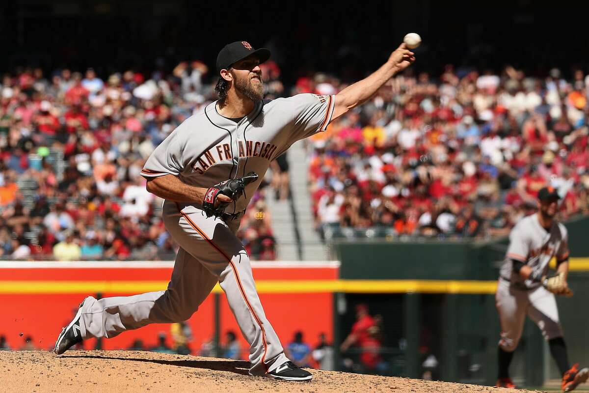 PHOENIX, AZ - APRIL 02: Starting pitcher Madison Bumgarner #40 of the San Francisco Giants pitches against the Arizona Diamondbacks during the fourth inning of the MLB opening day game at Chase Field on April 2, 2017 in Phoenix, Arizona. (Photo by Christian Petersen/Getty Images)