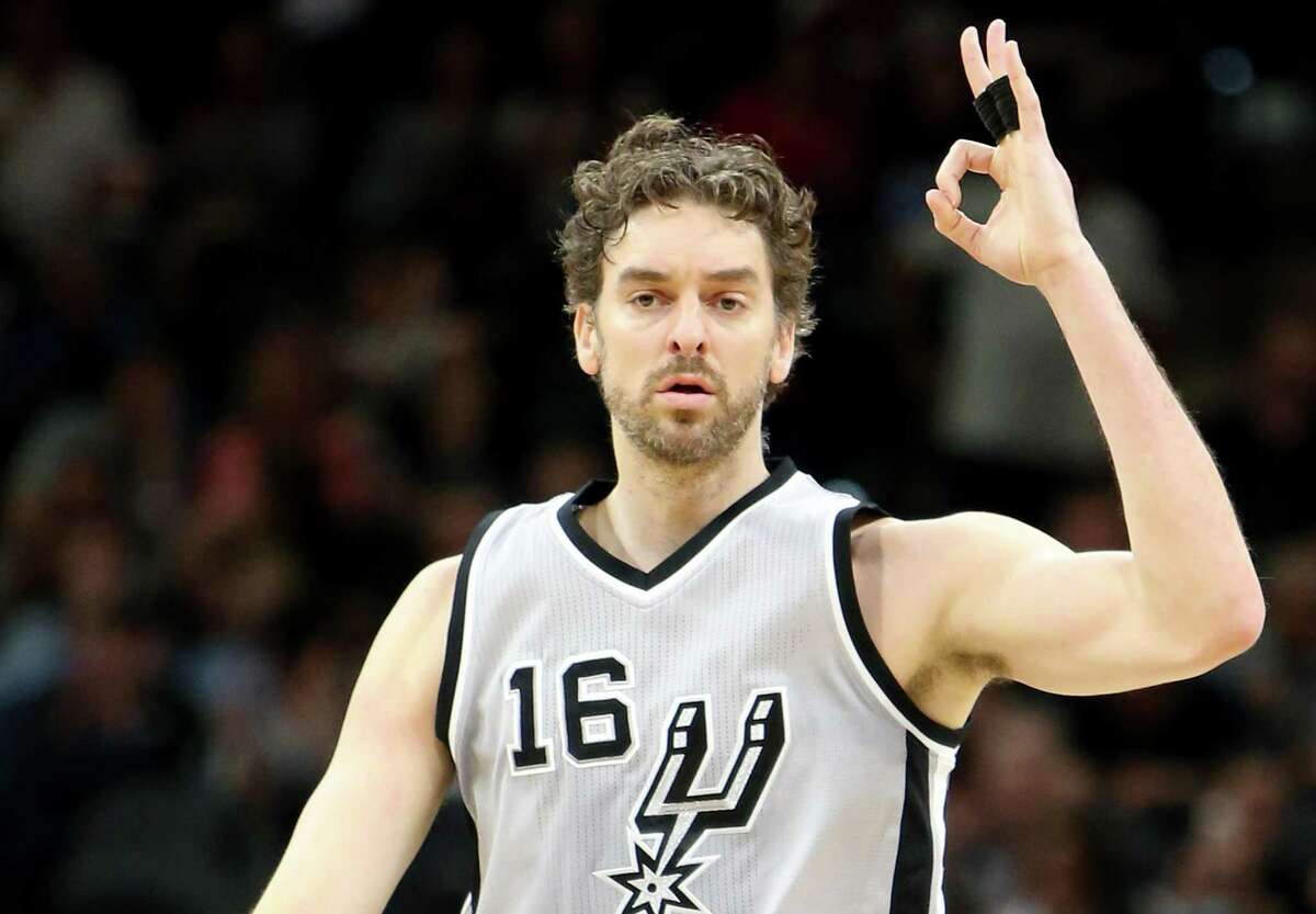 Spurs’ Pau Gasol reacts after making a 3-pointer against the Utah Jazz on April 2, 2017 at the AT&T Center.