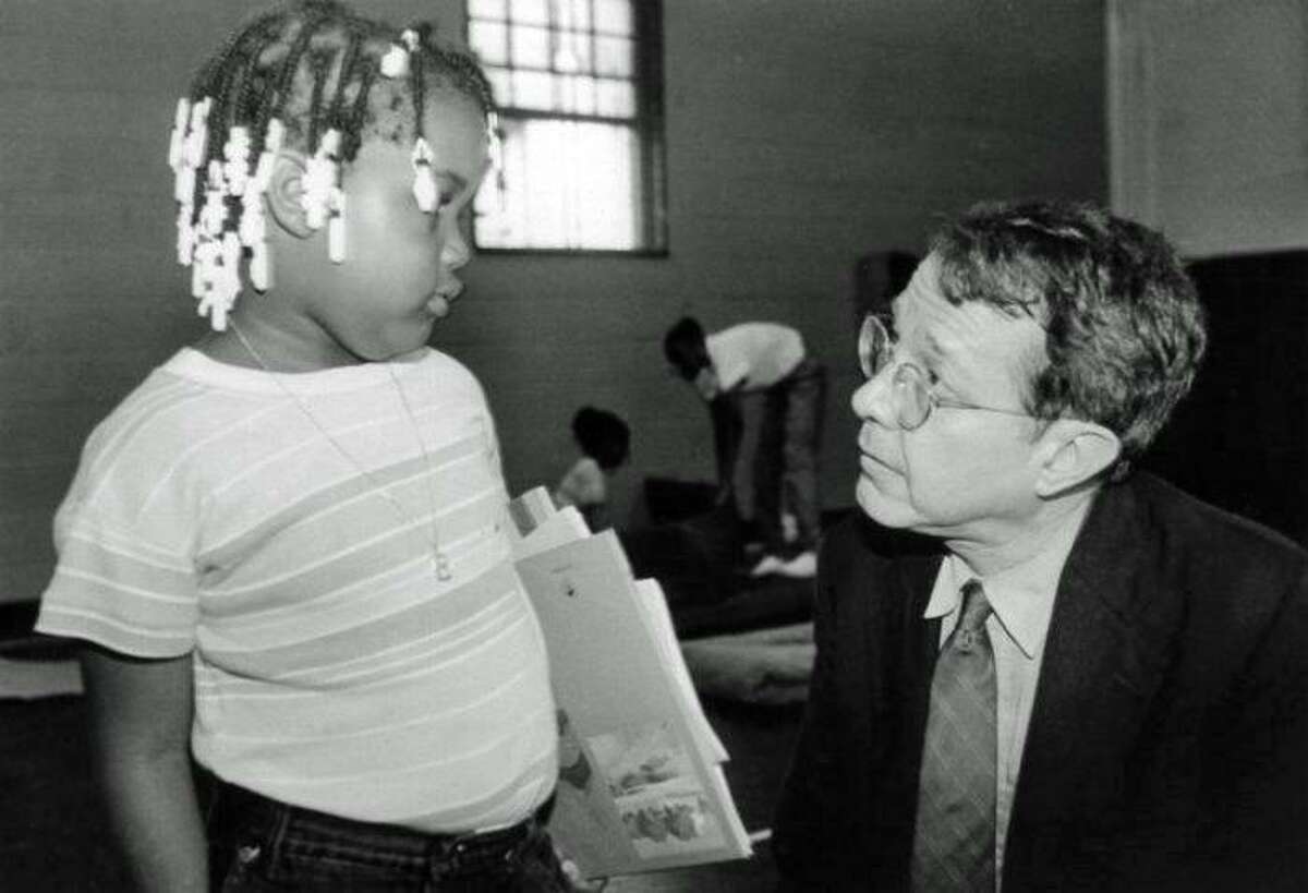 Author Jonathan Kozol speaking in 1993 to Pineapple, one of the children whose life he chronicles in his book "Fire in the Ashes."