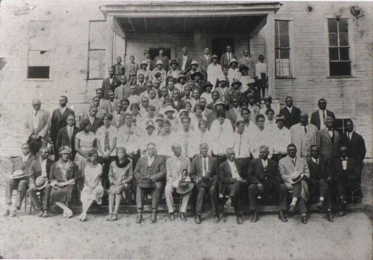 The faculty and staff of the Conroe Normal and Industrial College. The college was established by Dr. Jimmie Johnson in April 1903.