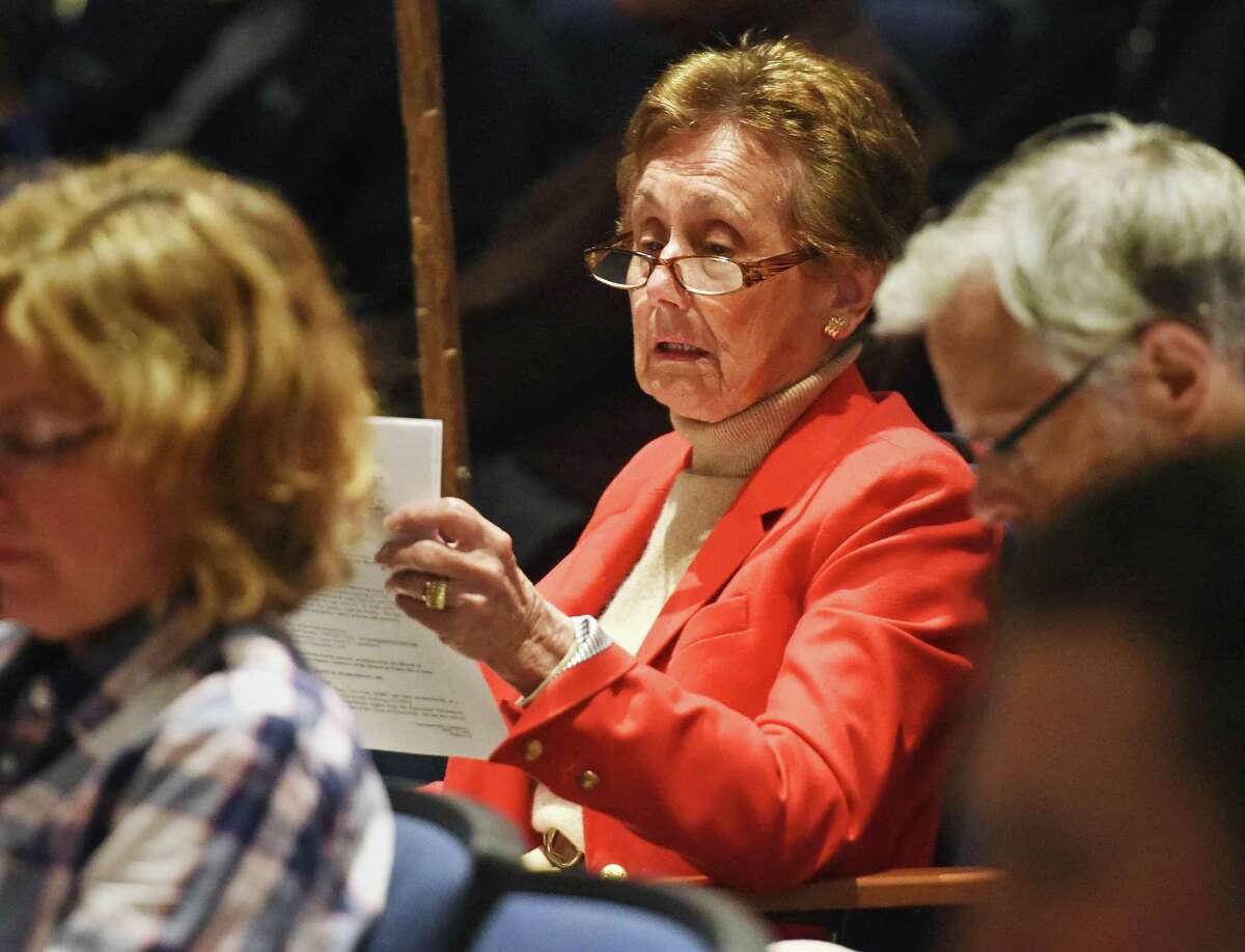 Moderator Pro-Tempore Joan Caldwell looks over a file during the Representative Town Meeting at Central Middle School in Greenwich, Conn. Monday, April 13, 2015.