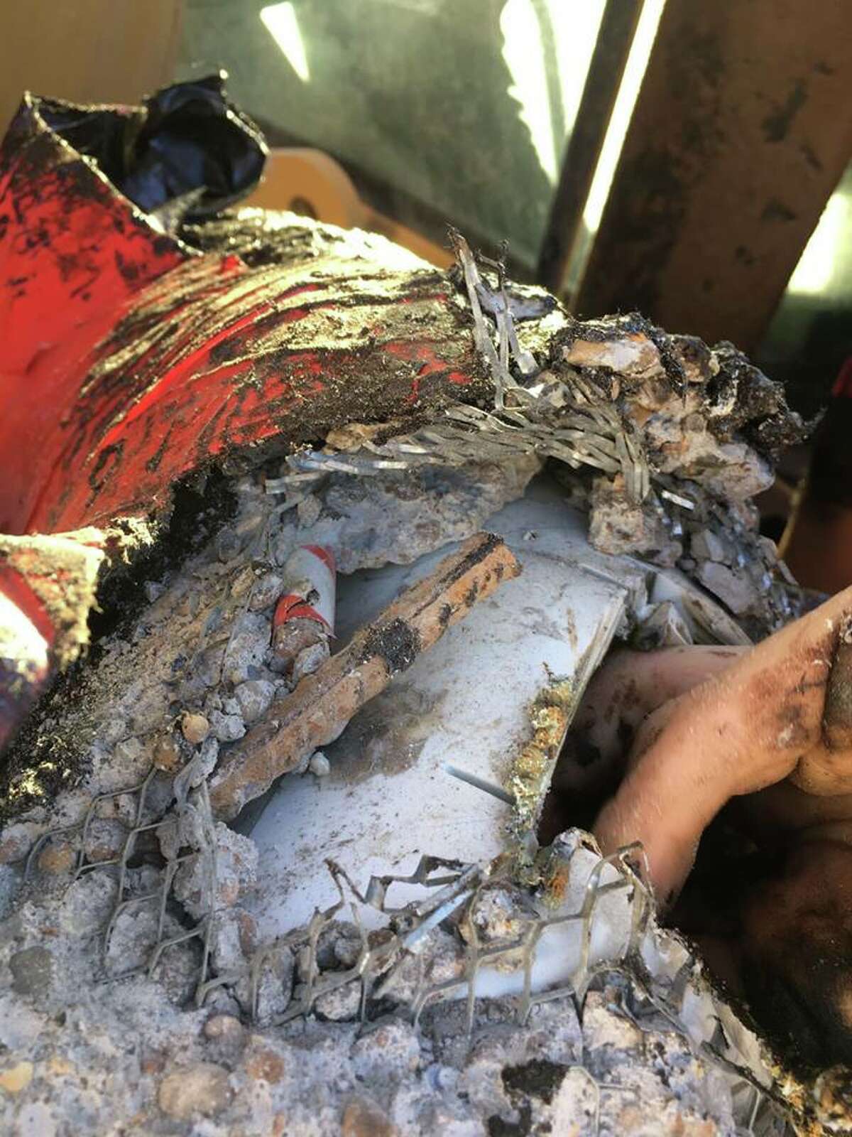 Presidio County deputies had to cut through wire mesh, rebar, concrete and plastic piping to remove a homemade cast attaching Anna Kruger, 21, to a Trans-Pecos Pipeline excavator on March 14, 2017. Courtesy of the Presidio County SheriffÂs Office