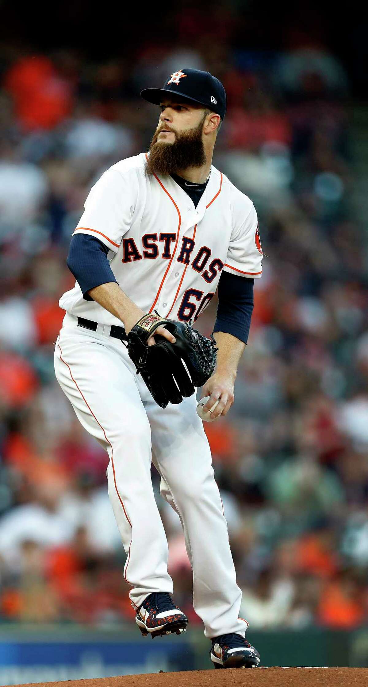 Houston Astros starting pitcher Dallas Keuchel (60) pitches in the first inning of the Houston Astros at Minute Maid Park, Friday, March 31, 2017, in Houston.