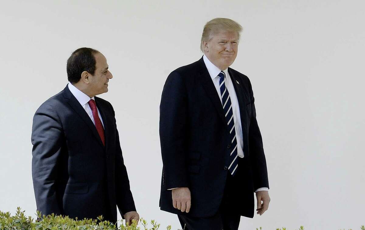 WASHINGTON, DC - APRIL 03: (AFP OUT) U.S. President Donald Trump (R) and Egypt President Abdel Fattah Al Sisi leave the Oval Office of White House to walk to the Residenceon April 3, 2017 in Washington, DC. President Trump and President Al Sisi are scheduled to participate in an expanded bilateral meeting. (Photo by Olivier Douliery-Pool/Getty Images) ORG XMIT: 700029195