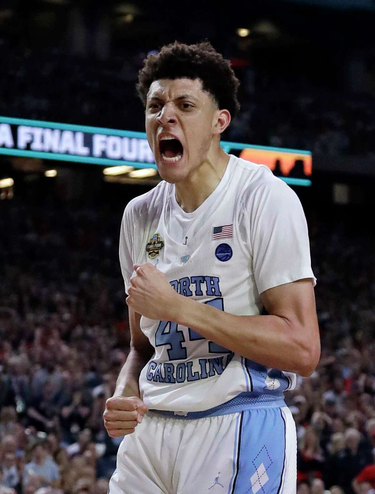North Carolina's Justin Jackson (44) reacs after making a shot during the second half in the finals of the Final Four NCAA college basketball tournament against Gonzaga, Monday, April 3, 2017, in Glendale, Ariz. (AP Photo/David J. Phillip)