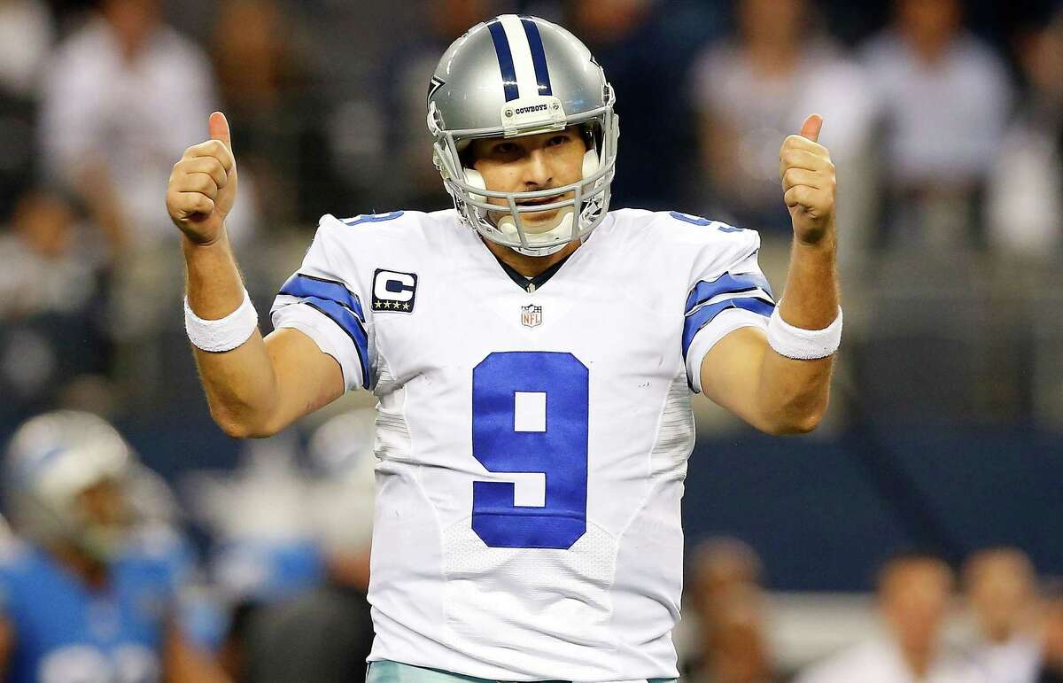 Tony Romo of the Dallas Cowboys gestures against the Detroit Lions during the second half of their NFC Wild Card Playoff game at AT&T Stadium on Jan. 4, 2015 in Arlington.