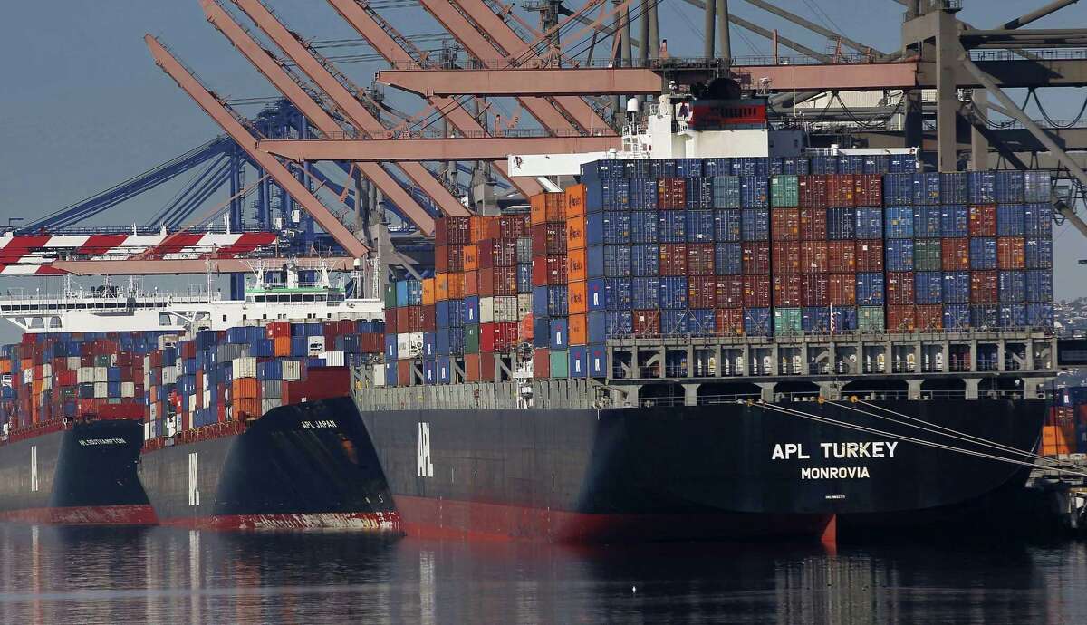Container ships wait to be unloaded at the Port of Los Angeles. The U.S. trade deficit fell to $43.6 billion in February, 9.6 percent below January’s deficit of $48.2 billion. Imports dropped 1.8 percent to $236.4 billion as the flow of Chinese goods tumbled by $8.6 billion, led by a big drop in cellphone imports.