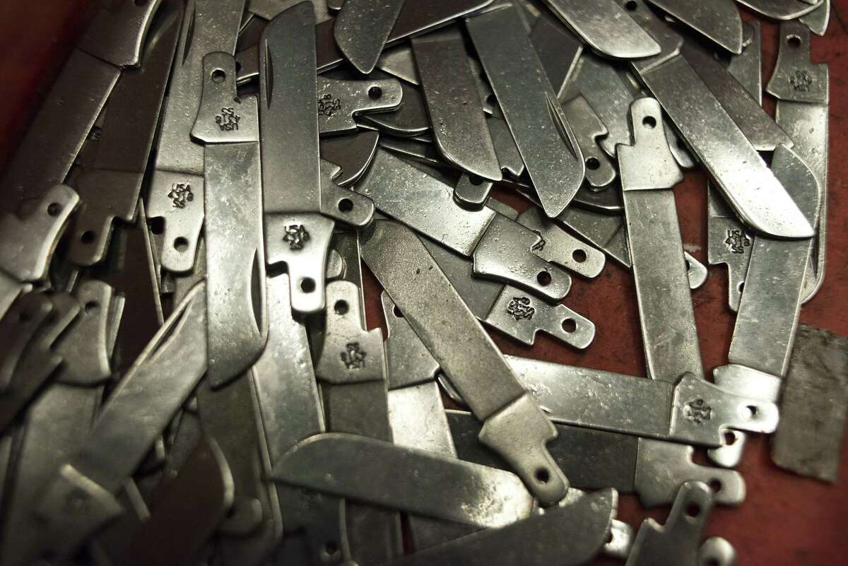 Blades sit in a pile at the W.R. Case & Sons Cutlery Co. manufacturing facility in Bradford, Penn. American manufacturers are slowly recovering from a weak patch caused by falling demand for American exports, reflecting weak economies overseas and the strength of the dollar, which makes U.S. products cost more in foreign markets.
