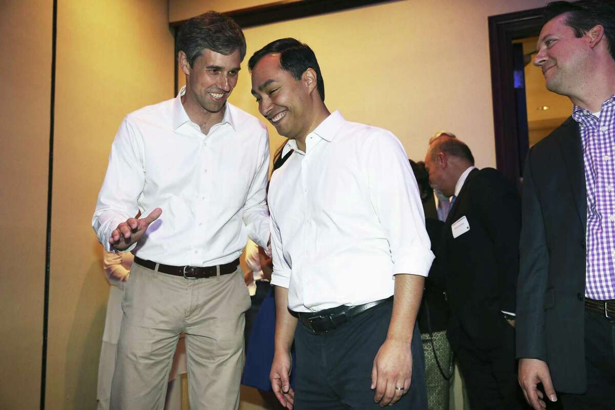 U.S. Congressmen Beto O’Rourke (left) and Joaquin Castro talk at the DNC event.