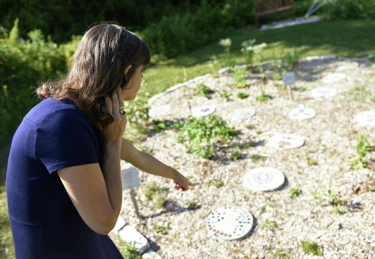 Audubon Greenwich Director Michelle Frankel showed the stepping stones created by students at Carmel Academy that line the sensory garden of the Nature Play Trail at the Audubon Greenwich last August.