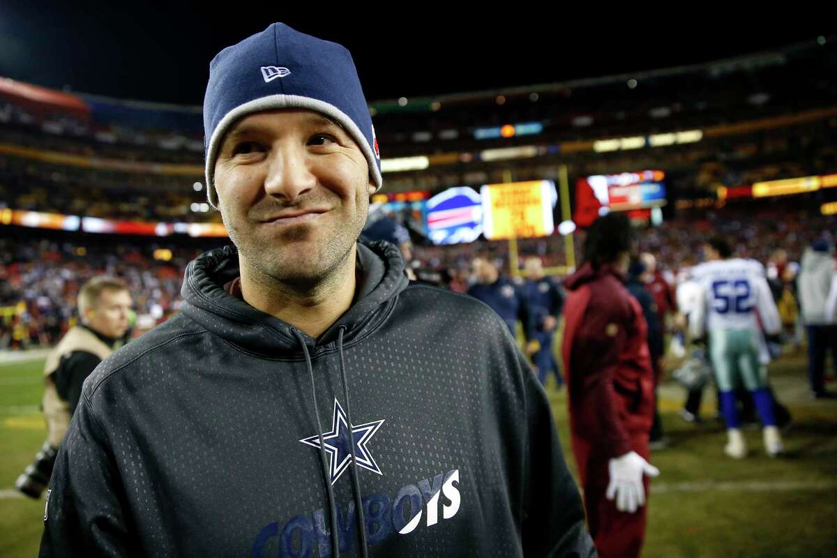 LANDOVER, MD - DECEMBER 7: Quarterback Tony Romo #9 of the Dallas Cowboys walks off of the field after a win over the Washington Redskins 19-16 at FedExField on December 7, 2015 in Landover, Maryland. (Photo by Rob Carr/Getty Images) ORG XMIT: 587435981