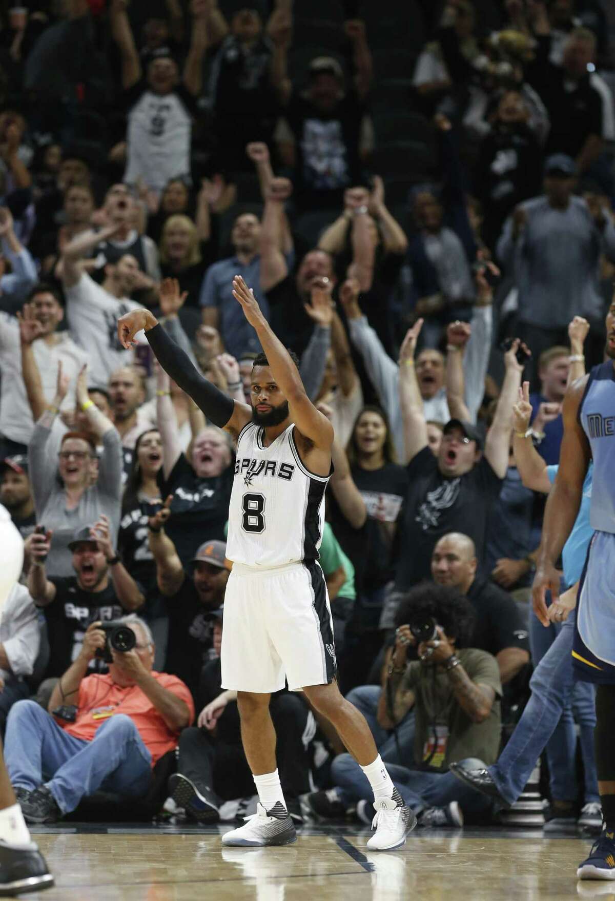 Spurs' Patty Mills (08) holds a pose after hitting a three-pointer in overtime against the Memphis Grizzlies during their game at the AT&T Center on Tuesday, Apr. 4, 2017. Spurs defeated the Grizzlies in overtime, 95-89. (Kin Man Hui/San Antonio Express-News)