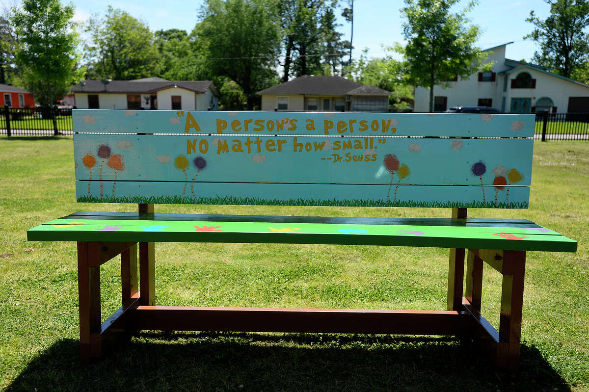 A buddy bench made by students from the Youth Leadership Southeast Texas program sits on the playground at Jones-Clark Elementary School on Tuesday. The bench will give students a place to sit and find new friends when they don't have anyone to play with. Photo taken Tuesday 4/4/17 Ryan Pelham/The Enterprise