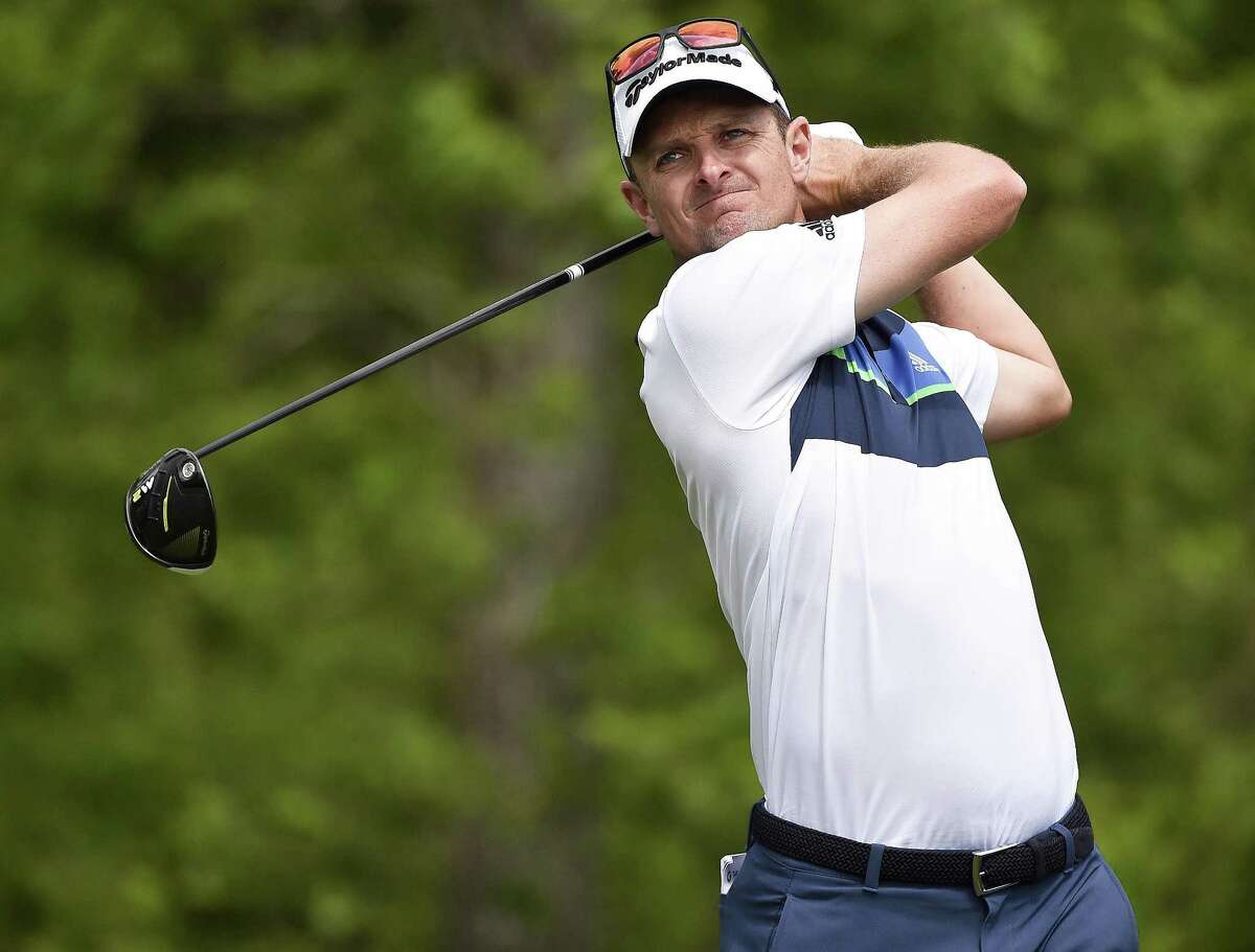 Justin Rose hits his tee shot on the 13th hole during the third round of the Houston Open on April 1, 2017, in Humble.