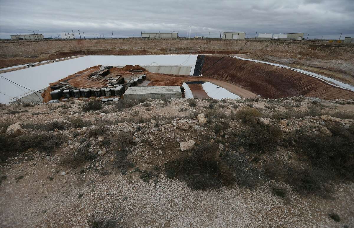 Hundreds of heavy metal casks containing low-level nuclear waste is seen capped by concrete and then layered with Dockum - a clay unique to the area at Waste Control Specialists (WCS) near Andrews, Texas on Tuesday, Feb. 14, 2017. A point of order by state Rep. Tom Craddick ultimately killed Brooks Landgraf’s radioactive nuclear waste bill.