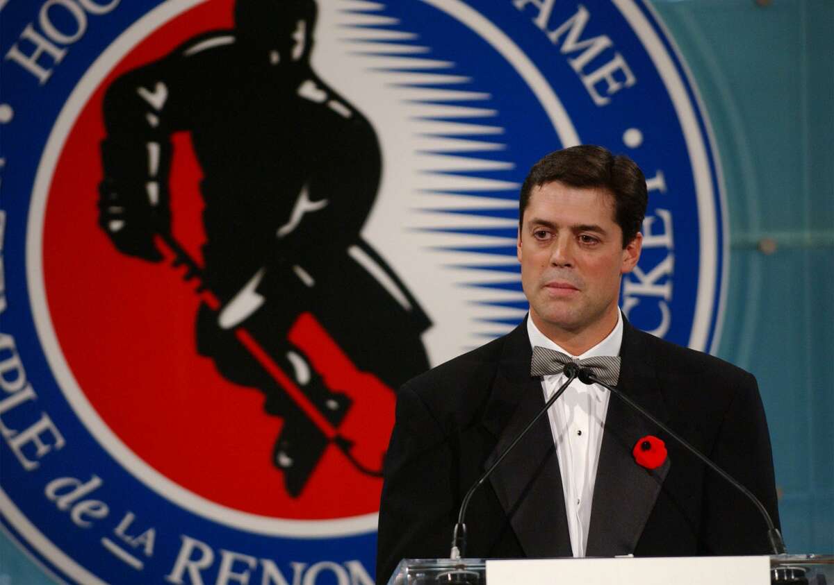 Pat LaFontaine speaks at the 2003 Hockey Hall of Fame induction ceremony in Toronto on Monday, Nov. 3, 2003.