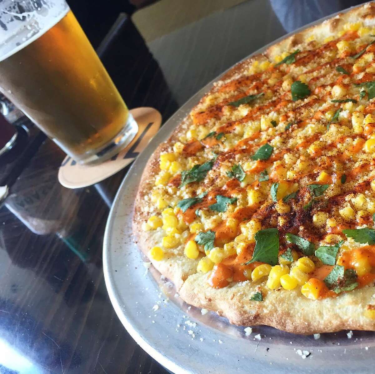 This restaurant selling elote, Hot Cheetos pizza needs to come to San  Antonio