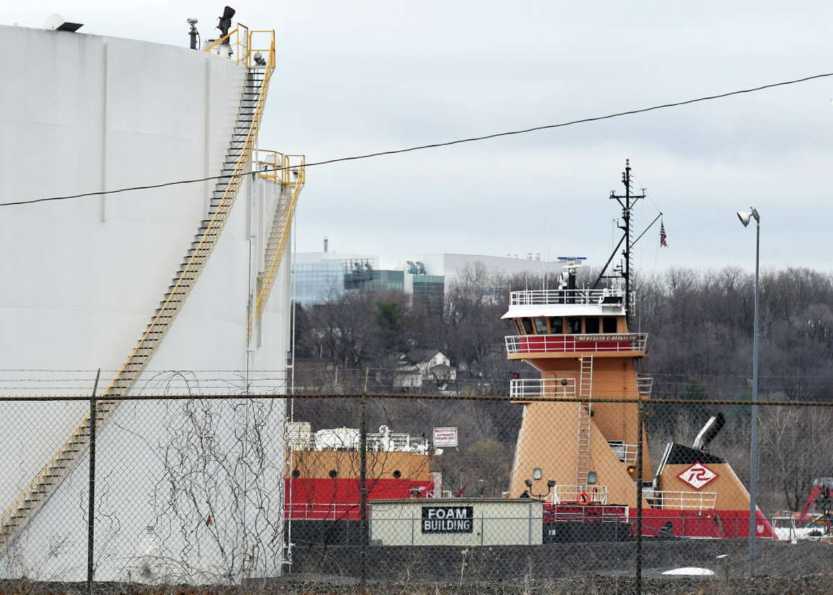 Gasoline is offloaded from a barge at the Global Albany terminal Wednesday April 5, 2017 in Albany, NY, after it got stuck in the Hudson River near Catskill yesterday. (John Carl D'Annibale / Times Union)