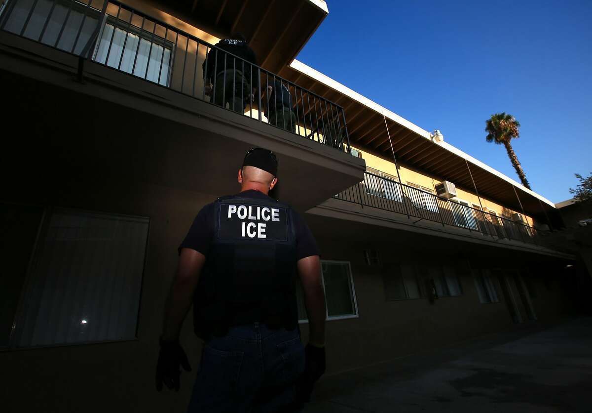 RIVERSIDE, CA - AUGUST 12: ICE Enforcement and Removal Operations unit raid to apprehend immigrants without any legal status and who may be deportable in Riverside. Immigration and Customs Enforcement officials say they are relying more than ever on costly manhunts to locate immigrants in the country illegally who have criminal records. In the past, the agency would simply contact local jails where such immigrants were being detained and ask jail officials to hold them until an ICE van could pick them up, but hundreds of counties across the country stopped honoring such requests after a federal judge last year found that practice unconstitutional. (Irfan Khan/Los Angeles Times via Getty Images)