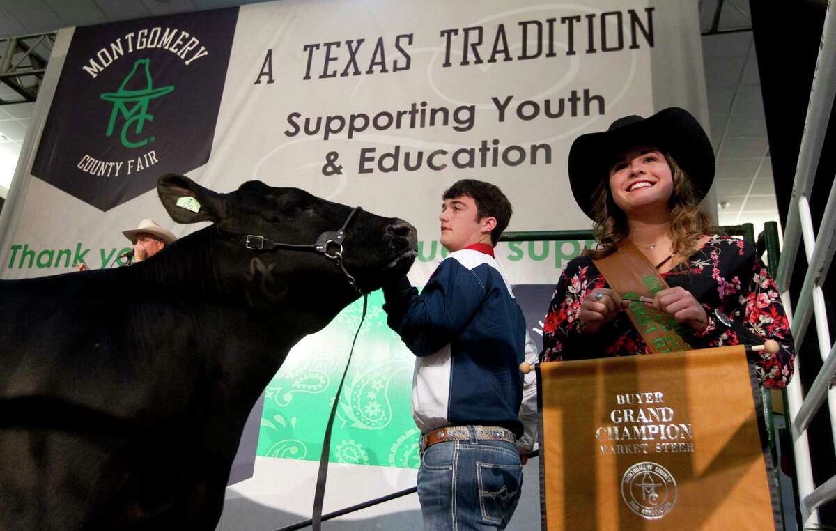 Jakob Dunn of Splendora FFA shows his grand champion steer during the Montgomery County Fair & Rodeo Junior Livestock Auction at the Lone Star Convention & Expo Center on Wednesday, April 5, 2017. Dunn's steer sold for $40,000.