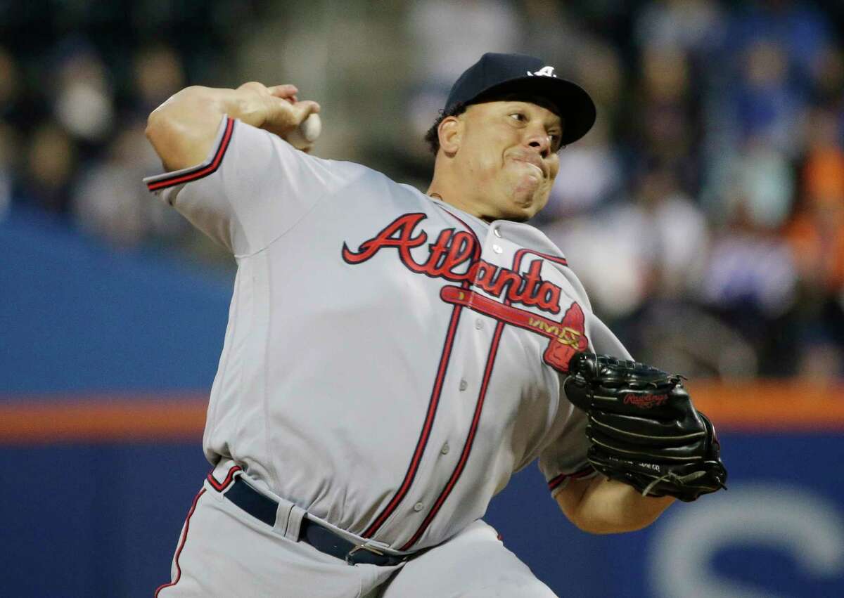 Atlanta Braves starting pitcher Bartolo Colon delivers a pitch during the first inning of a baseball game against the New York Mets, Wednesday, April 5, 2017, in New York. (AP Photo/Frank Franklin II) ORG XMIT: NYFF104