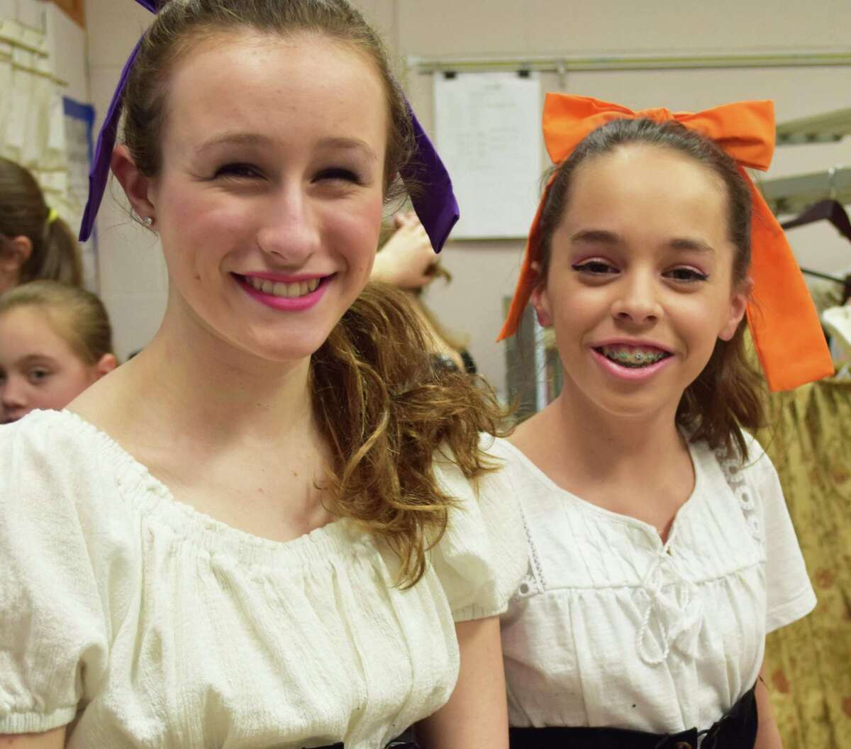 Spectrum/Emma Padros, left and Leah Lawson, who portray silly girls, are prepped to hit the stage for the March 28, 2017 dress rehearsal of "Beauty and The Beast Jr." at Schaghticoke Middle School in New Milford. The play will be staged several times beginning March 31, 2017.