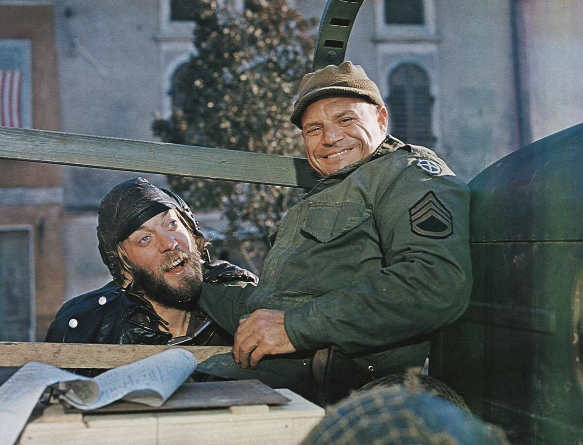 Donald Sutherland (left) and Don Rickles in the war film 'Kelly's Heroes', directed by Brian G. Hutton, 1970. (Photo by MGM Studios/Archive Photos/Getty Images)