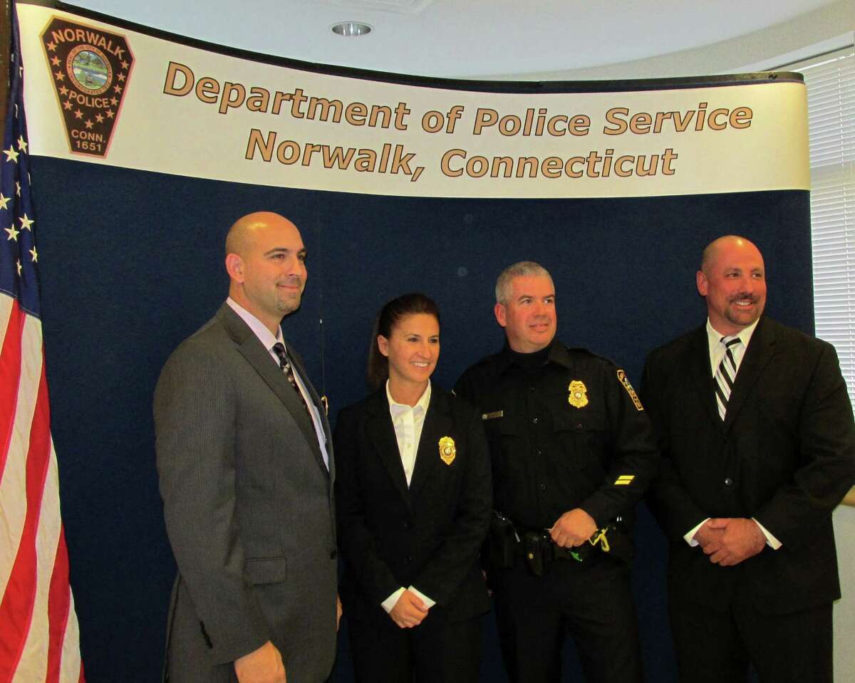 Norwalk Police Department - Promotions 10/28/2013 Pictured in the photo, from left to right: Officer John Taranto promoted to Detective, Sergeant Melissa Lepore promoted to Lieutenant, Officer Gregg Scully promoted to Sergeant, Detective Alex Tolnay promoted to Sergeant