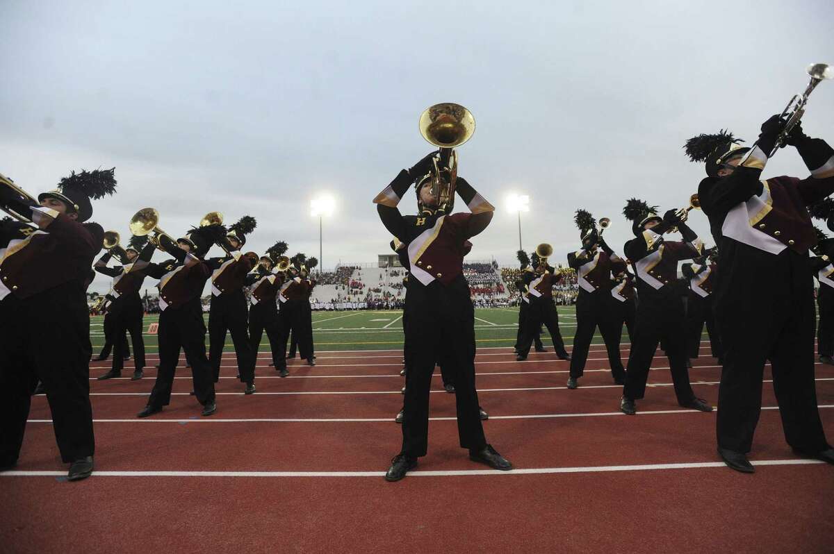 The Harlandale High Band stops in front of the stands during the 75th anniversary Battle of Flowers Band Festival, entitled "Celebrations!" at Comalander Stadium on April 25, 2013.