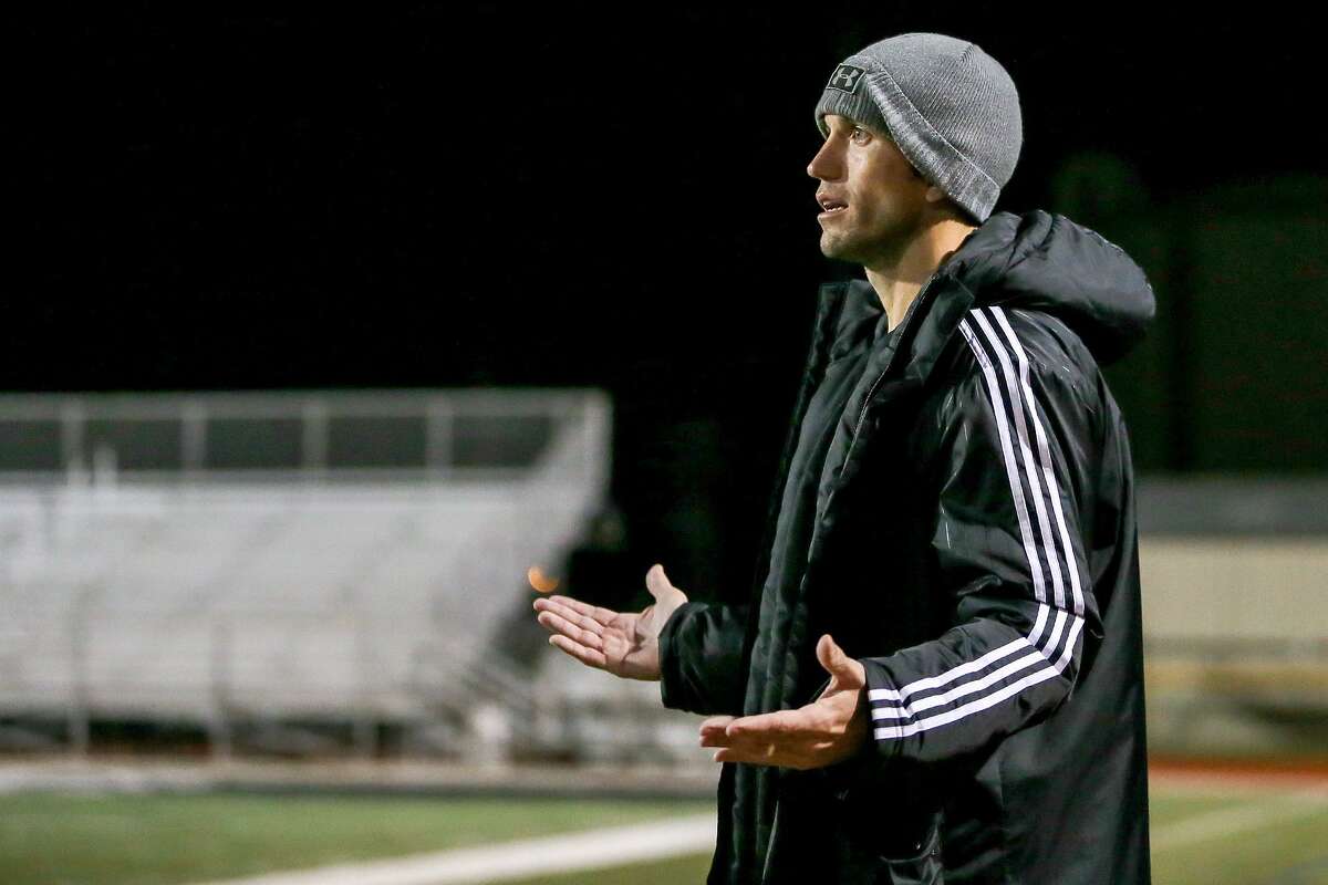 Steele girls soccer coach Justin Linthicum reacts to play on the field during their District 27-6A girls game against Clemens on Feb. 14, 2017.