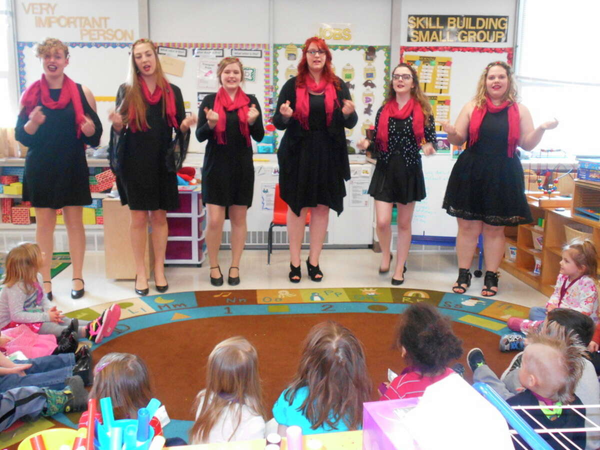 Midland High School Meister Singers preformed the song 'Lollypop' for the children in the Midland 3 Head Start Classroom at Longview Early Childhood Center.