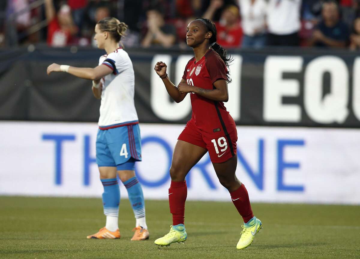 FRISCO, TX - APRIL 06: Crystal Dunn #19 of the U.S. reacts after scoring as Tatiana Sheikina #4 of Russia looks on during the first half of the International Friendly soccer match at Toyota Stadium on April 6, 2017 in Frisco, Texas. (Photo by Mike Stone/Getty Images)