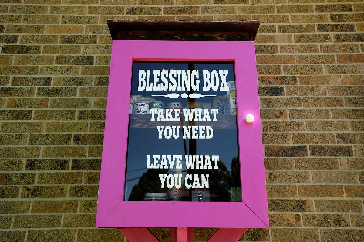 A blessing box outside of Debbie's Dance Studio in Groves is stocked with non-perishable foods and hygiene items for those in need. People are encouraged to take what they need or donate items to the box, made by Alicia Almaraz of Groves.Photo taken Thursday 4/6/17 Ryan Pelham/The Enterprise
