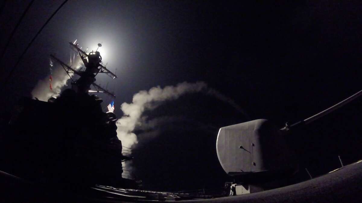MEDITERRANEAN SEA - APRIL 7: In this handout provided by the U.S. Navy,The guided-missile destroyer USS Porter fires a Tomahawk land attack missile on April 7, 2017 in the Mediterranean Sea. The USS Porter was one of two destroyers that fired a total of 59 cruise missiles at a Syrian military airfield in retaliation for a chemical attack that killed scores of civilians this week. The attack was the first direct U.S. assault on Syria and the government of President Bashar al-Assad in the six-year war there. (Photo by Ford Williams/U.S. Navy via Getty Images)
