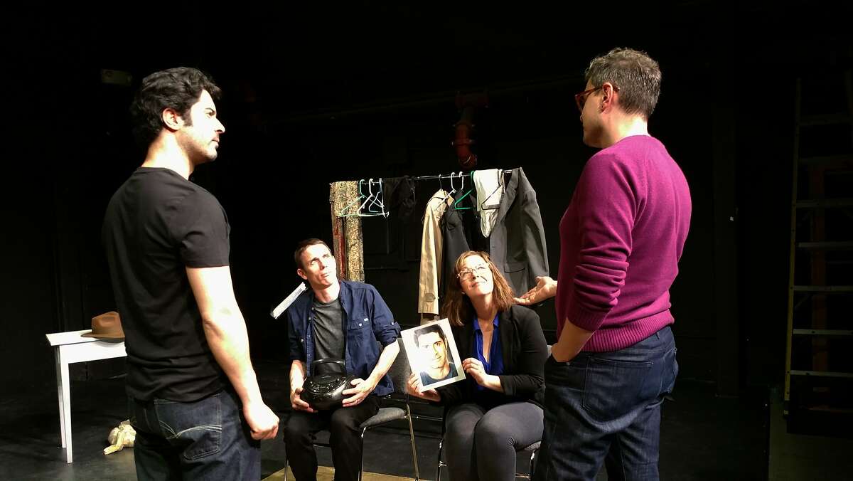 Director Evren Odcikin (right) works with actors (L to R) Damien Seperi, Alan Coyne, and Patricia Austin during a tech rehearsal for Autobiography of a Terrorist. Photo by Michelle Mulholland.