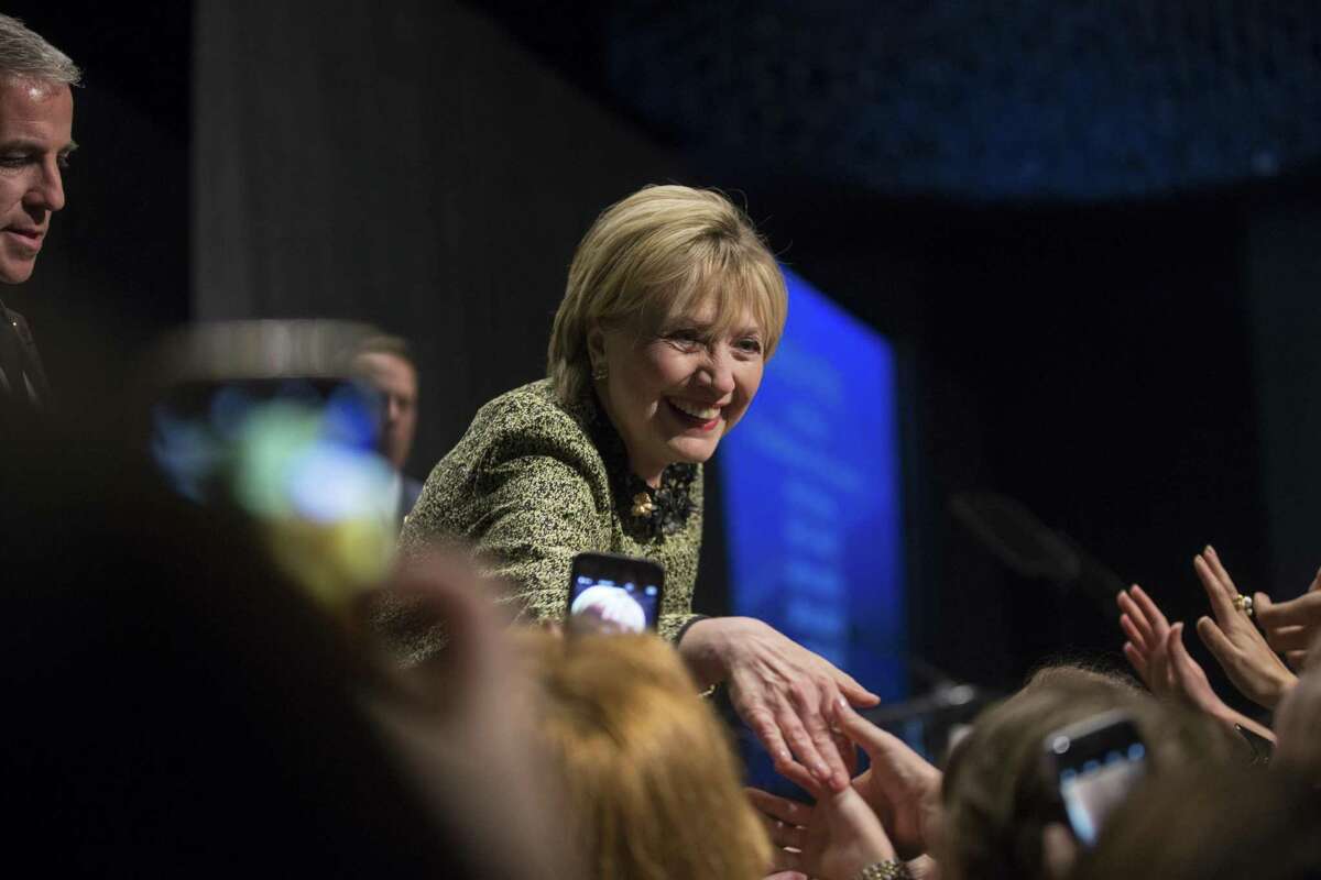 Secretary Hillary Rodham Clinton shakes hands after her speech at Annie's List annual Houston luncheon, Friday, April 7, 2017, in Houston.