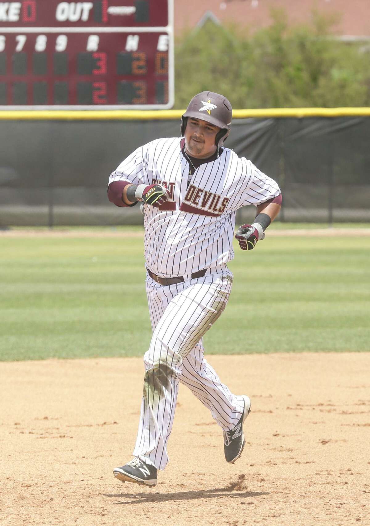 TAMIU’s Sergio Pollorena hit a ninth-inning home run in the Dustdevils’ 5-4 victory Friday.