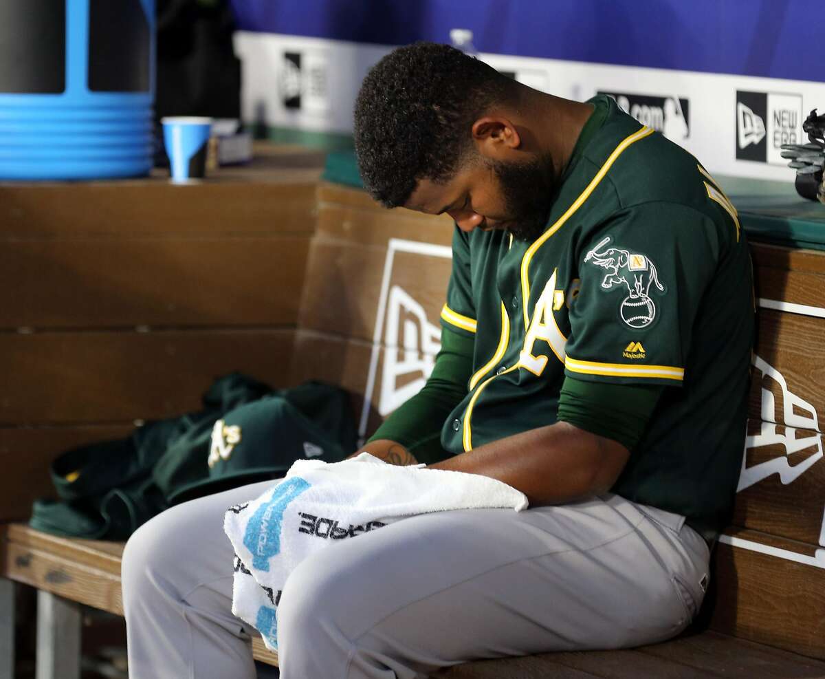 Oakland Athletics starting pitcher Raul Alcantara (50) sits in the dugout after giving up five runs to the Texas Rangers in the second inning at Globe Life Park in Arlington, Texas, on Friday, April 7, 2017. The Rangers won, 10-5. (Richard W. Rodriguez/Fort Worth Star-Telegram/TNS)