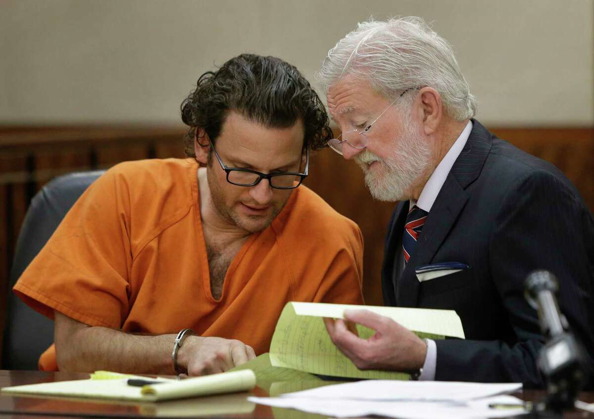 McDaniel's boyfriend, Leon Jacob, confers with attorney George Parnham on March 29. McDaniel's friends and family believe Jacob was behind the alleged plot to kill her ex-husband and his former girlfriend, saying she wouldn't have been capable of such a crime. "I started to have a gut feeling about him," her sister said. " … Something was just off."
